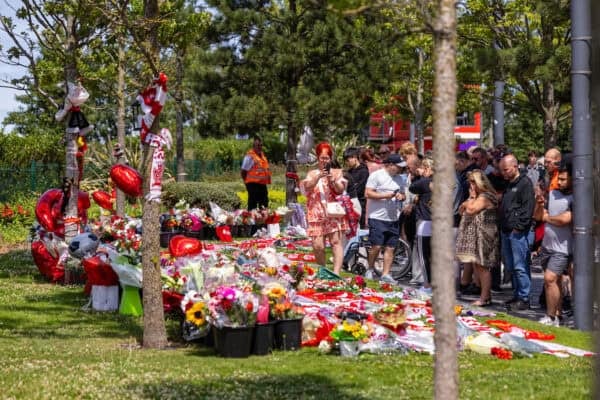 LIVERPOOL, ENGLAND - Thursday, July 3, 2025: Supporters look at the tributes at Anfield following the death of Liverpool Football Club's Portugal international football player Diogo Jota. (Pic by David Rawcliffe/Propaganda)