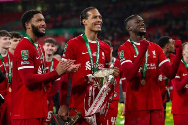 LONDON, ENGLAND - Sunday, February 25, 2024: Virgil van Dijk captain of Liverpool poses with the trophy with Ibrahim Konate and Joe Gomez after the Football League Cup Final match between Chelsea FC and Liverpool FC at Wembley Stadium. (Photo by Peter Powell/Propaganda)