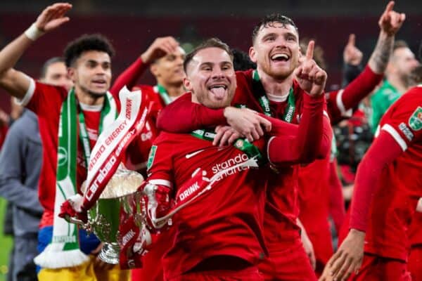 LONDON, ENGLAND - Sunday, February 25, 2024: Alexis Mac Allister of Liverpool poses with the trophy with Andy Robertson of Liverpool after the Football League Cup Final match between Chelsea FC and Liverpool FC at Wembley Stadium. (Photo by Peter Powell/Propaganda)