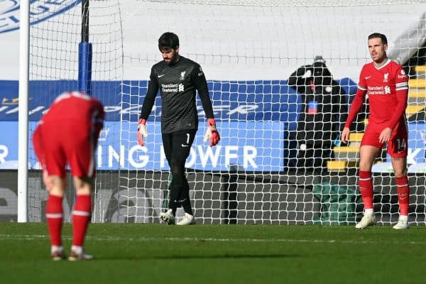 2EC6AFE Liverpool goalkeeper Alisson (centre) stands dejected after conceding the third Leicester goal during the Premier League match at the King Power Stadium, Leicester. Picture date: Saturday February 13, 2021. (PA Images / Alamy Stock Photo)