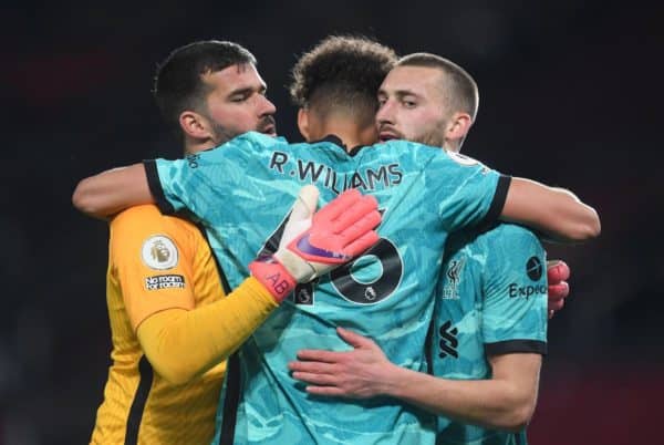 Liverpool goalkeeper Alisson (left), Rhys Williams (centre) and Nathaniel Phillips celebrate after the Premier League match at Old Trafford, Manchester. Picture date: Thursday May 13, 2021.