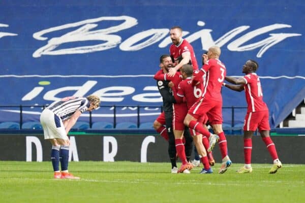 2FND1NB Liverpool goalkeeper Alisson celebrates with teammates after scoring his sides second goal during the Premier League match at The Hawthorns, West Bromwich. Picture date: Sunday May 16, 2021.