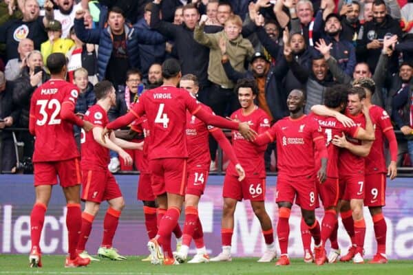 2H145N6 Liverpool's Roberto Firmino (right) celebrates scoring their side's third goal of the game during the Premier League match at Vicarage Road, Watford. Picture date: Saturday October 16, 2021.