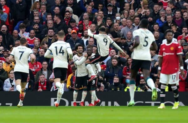 Liverpool's Naby Keita (centre) celebrates scoring their side's first goal of the game with team mates during the Premier League match at Old Trafford, Manchester. Picture date: Sunday October 24, 2021.