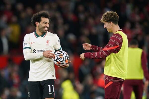 Liverpool hat-trick scorer Mohamed Salah (left) celebrates with the match ball after the final whistle during the Premier League match at Old Trafford, Manchester. Picture date: Sunday October 24, 2021.