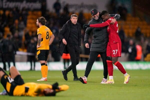 2H95FTW Liverpool manager Jurgen Klopp and Divock Origi celebrate after the Premier League match at Molineux Stadium, Wolverhampton. Picture date: Saturday December 4, 2021.