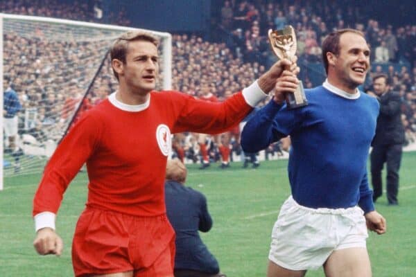 1966 FA Charity Shield Merseyside derby match between Liverpool and Everton at Goodison Park. Before the game, Roger Hunt, Alan Ball and Ray Wilson paraded the World Cup, the FA Cup and the Football League Trophy around Goodison Park. Picture shows: Roger Hunt and Ray Wilson, members of the summer's victorious England team, parading the World Cup trophy around the stadium. 13th August 1966. (Image: Trinity Mirror / Mirrorpix / Alamy Stock Photo)