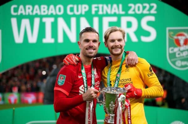 2HT924Y Liverpool's Jordan Henderson (left) and goalkeeper Caoimhin Kelleher celebrate with the trophy after winning the Carabao Cup final at Wembley Stadium, London. Picture date: Sunday 27th February, 2022.