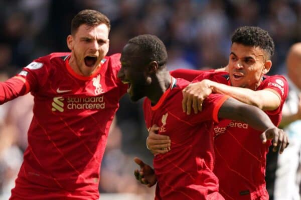 2J6BM3T Liverpool's Naby Keita (centre) celebrates scoring their side's first goal of the game with team-mates Andrew Robertson (left) and Luis Diaz (right) during the Premier League match at St. James' Park, Newcastle upon Tyne. Picture date: Saturday April 30, 2022.