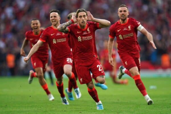 2J8AC5D Liverpool's Kostas Tsimikas celebrates scoring the winning penalty during the Emirates FA Cup final at Wembley Stadium, London. Picture date: Saturday May 14, 2022.