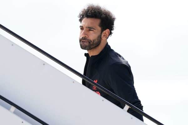 Liverpool’s Mohamed Salah boards the plane before flying out of John Lennon Airport, ahead of the UEFA Champions League Final in Paris on Saturday. Picture date: Friday May 27, 2022.