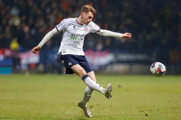 2M2467K Conor Bradley #21 of Bolton Wanderers crosses the ball during the Papa John's Trophy match Bolton Wanderers vs Manchester United U21 at University of Bolton Stadium, Bolton, United Kingdom, 13th December 2022 (Photo by Phil Bryan/News Images)