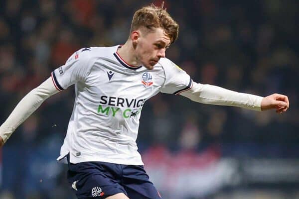 2M2467K Conor Bradley #21 of Bolton Wanderers crosses the ball during the Papa John's Trophy match Bolton Wanderers vs Manchester United U21 at University of Bolton Stadium, Bolton, United Kingdom, 13th December 2022 (Photo by Phil Bryan/News Images)