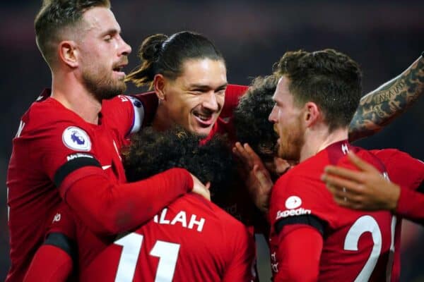 Liverpool's Mohamed Salah celebrates with his team-mates after scoring their side's first goal of the game during the Premier League match at Anfield, Liverpool. Picture date: Monday February 13, 2023.