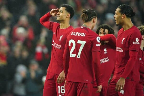 2P3N6XK Liverpool's Cody Gakpo (left) celebrates scoring their side's third goal of the game with team-mates during the Premier League match at Anfield, Liverpool. Picture date: Sunday March 5, 2023.