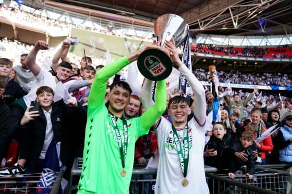 2PJG2H9 Bolton Wanderers? James Trafford (left) and Bolton Wanderers? Conor Bradley celebrate with the trophy following their victory in the Papa Johns Trophy final at Wembley Stadium, London. Picture date: Sunday April 2, 2023.