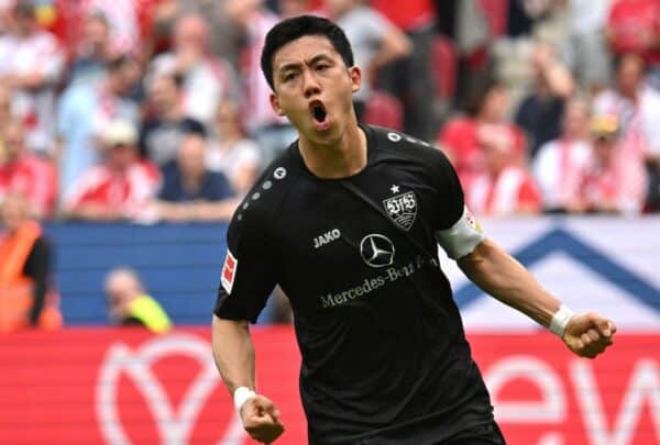 Stuttgart's Wataru Endo celebrates scoring during the Bundesliga soccer match between FSV Mainz 05 - VfB Stuttgart at Mewa Arena, in Mainz, Germany, Sunday May 21, 2023. (Torsten Silz/dpa via AP)