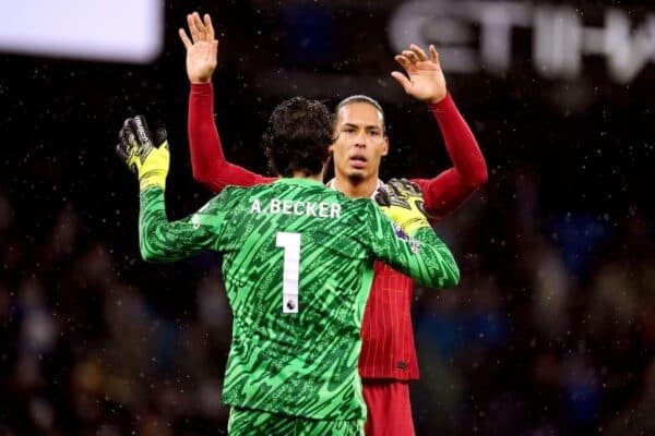Liverpool's Virgil van Dijk celebrates their victory with Liverpool goalkeeper Alisson Becker at the end of the match following the Premier League match at the Etihad Stadium, Manchester. Picture date: Sunday February 23, 2025.
