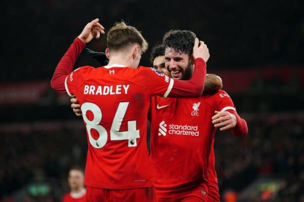 2WFM8C8 Liverpool's Dominik Szoboszlai celebrates scoring their side's third goal of the game with team-mates Luis Diaz and Conor Bradley during the Premier League match at Anfield, Liverpool. Picture date: Wednesday January 31, 2024.