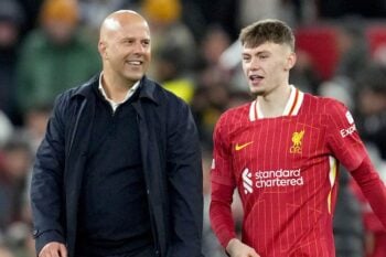 Liverpool’s manager Arne Slot and Liverpool’s Conor Bradley react at the end of the Champions League opening phase soccer match between Liverpool and Real Madrid at Anfield Stadium, Liverpool, England, Wednesday, Nov. 27, 2024. (AP Photo/Jon Super)