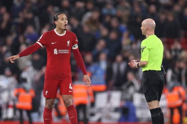 LIVERPOOL, ENGLAND - Monday, January 1, 2024: Referee Anthony Taylor and Virgil van Dijk during the FA Premier League match between Liverpool FC and Newcastle United FC at Anfield. (Photo by David Rawcliffe/Propaganda)