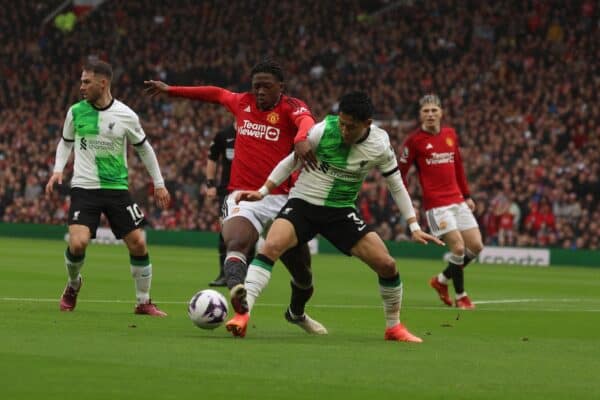 MANCHESTER, ENGLAND - Sunday, April 7, 2024: Liverpool's Wataru Endo and Manchester United's Kobbie Mainoo during the FA Premier League match between Manchester United FC and Liverpool FC at Old Trafford (Photo by David Rawcliffe/Propaganda)