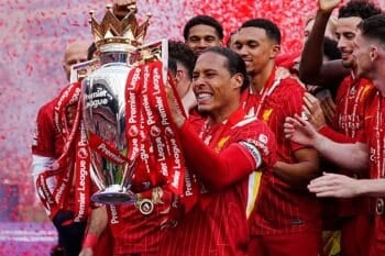 Liverpool’s Virgil van Dijk and team-mates celebrate with the Premier League trophy after the Premier League match at Anfield, Liverpool. Picture date: Sunday May 25, 2025.