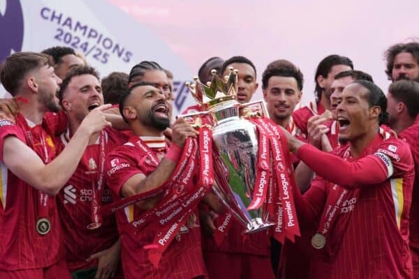 3BDPT90 Liverpool's captain Virgil van Dijk, right, Mohamed Salah, center left, and teammates celebrate with the winner's trophy after the English Premier League soccer match between Liverpool and Crystal Palace at the Anfield stadium in Liverpool, England, Sunday, May 25, 2025. (AP Photo/Jon Super)