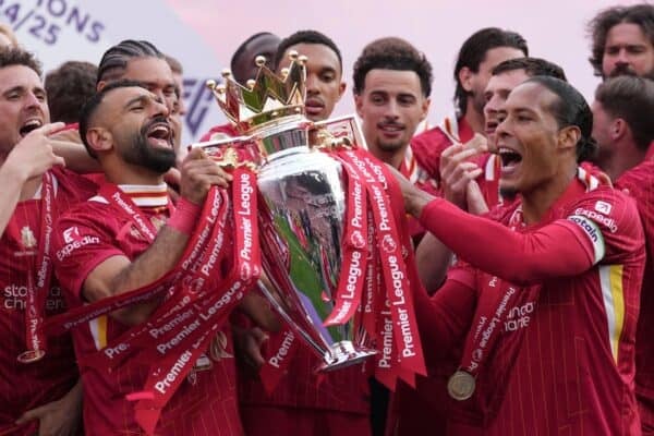 3BDPT90 Liverpool's captain Virgil van Dijk, right, Mohamed Salah, center left, and teammates celebrate with the winner's trophy after the English Premier League soccer match between Liverpool and Crystal Palace at the Anfield stadium in Liverpool, England, Sunday, May 25, 2025. (AP Photo/Jon Super)