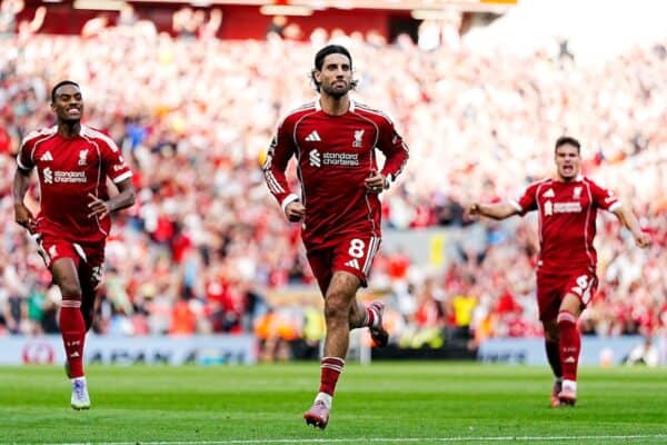 Dominik Szoboszlai (centre) celebrates scoring their side's first goal during the Premier League match at Anfield, Liverpool. Picture date: Sunday August 31, 2025. (Alamy Photo)
