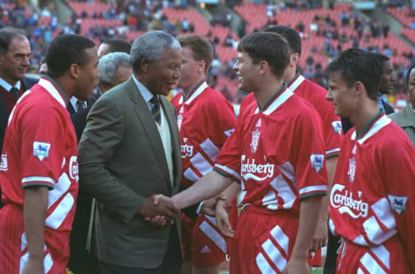 JOHANNESBURG, REPUBLIC OF SOUTH AFRICA - Sunday, May 29, 1994: Life-long Liverpool FC supporter and newly elected President of the Republic of South Africa Nelson Mandela meets the Liverpool players before the United Bank Soccer Festival friendly match at Ellis Park Stadium. John Barnes and Phil Charnock. (Pic by David Rawcliffe/Propaganda)