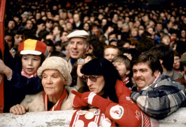 Family 1980s UK three generations Liverpool football fans Anfield Kop circa 1985. 80s HOMER SYKES. Image shot 1985. Exact date unknown.