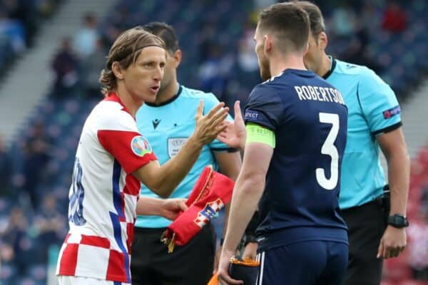 GLASGOW, SCOTLAND - JUNE 22: Luka Modric of Croatia interacts with Andrew Robertson of Scotland during the coin toss prior to the UEFA Euro 2020 Championship Group D match between Croatia and Scotland at Hampden Park on June 22, 2021 in Glasgow, Scotland. (Photo by Jan Kruger - UEFA/UEFA via Getty Images)