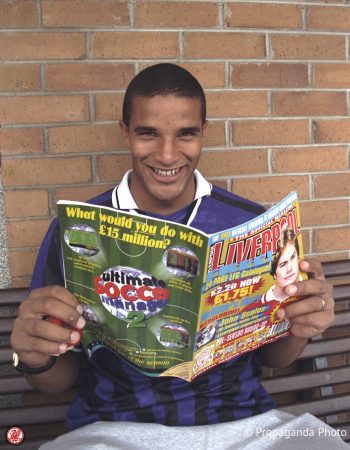 Liverpool goalkeeper poses with a copy of the club's new official magazine at the club's Melwood Training Ground. (Pic by David Rawcliffe/Propaganda).