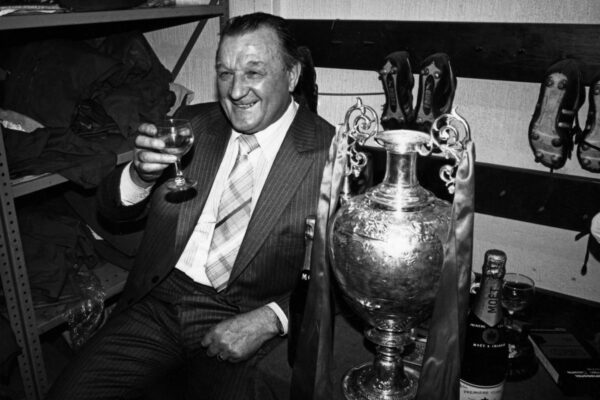 ET02KP Liverpool manager Bob Paisley celebrates with a glass of champagne in the dressing room at Anfield after his team had won the league championship for a record 13th time after a 3-1 victory over Spurs. 15th May 1982.