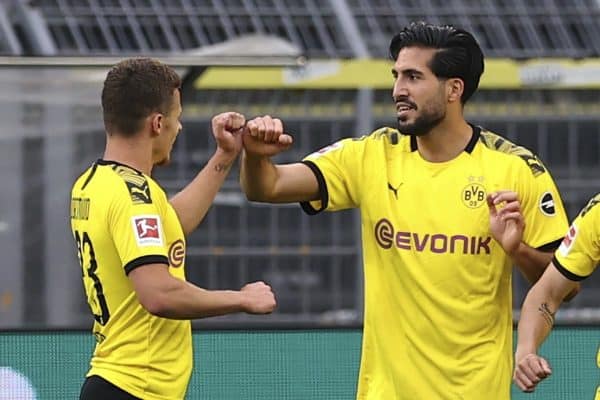 Emre Can of Borussia Dortmund cheers on his goal during the German Bundesliga soccer match between Borussia Dortmund and Hertha BSC Berlin in Dortmund , Germany, Saturday, June 6, 2020. (Lars Baron, Pool via AP)