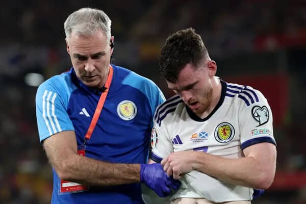 Scotland's Andrew Robertson is helped from the pitch after picking up an arm injury during the UEFA Euro 2024 Qualifying Group D match at the Estadio La Cartuja de Sevilla in Seville, Spain. Picture date: Thursday October 12, 2023. Isabel Infantes/PA Wire/PA Images