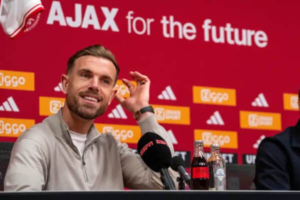 Jordan Henderson (left) and Ajax coach John van‘t Schip pictured during a press conference in Amsterdam (Peter Dejong/AP)