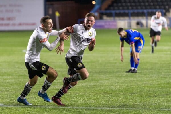 Widnes players celebrate a goal