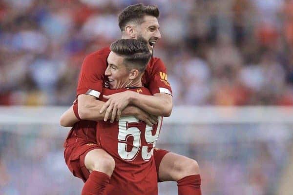 GENEVA, SWITZERLAND - Wednesday, July 31, 2019: Liverpool's Harry Wilson celebrates scoring the third goal with team-mate Adam Lallana (L) during a pre-season friendly match between Liverpool FC and Olympique Lyonnais at Stade de Genève. (Pic by David Rawcliffe/Propaganda)