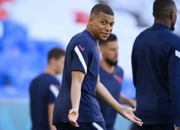 MUNICH, GERMANY - JUNE 14: Kylian Mbappe of France reacts during the France Training Session ahead of the Euro 2020 Group match between France and Germany at Fussball Arena Muenchen on June 14, 2021 in Munich, Germany. (Photo by Sebastian Widmann - UEFA/UEFA via Getty Images)