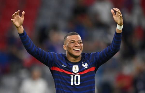 MUNICH, GERMANY - JUNE 15: Kylian Mbappe of France reacts after being challenged by Mats Hummels (Not pictured) of Germany during the UEFA Euro 2020 Championship Group F match between France and Germany at Football Arena Munich on June 15, 2021 in Munich, Germany. (Photo by Sebastian Widmann - UEFA/UEFA via Getty Images)