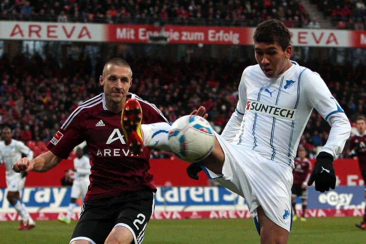 10.12.2011, easy Credit Stadion, Nuernberg, GER, 1.FBL, 1. FC Nürnberg/ Nuernberg vs TSG 1899 Hoffenheim, im Bild:Timmy Simons (Nuernberg #2) im Zweikampf mit Roberto Firmino (Hoffenheim #22). // during the Match GER, 1.FBL, 1. FC Nürnberg/ Nuernberg vs TSG 1899 Hoffenheim on 2011/12/10, easy Credit Stadion, Nuernberg, Germany..EXPA Pictures © 2011, PhotoCredit: EXPA/ nph/ Will..***** ATTENTION - OUT OF GER, CRO *****