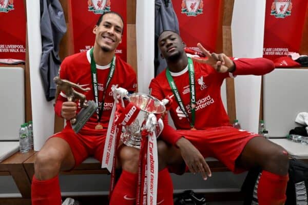 Virgil van Dijk captain of Liverpool and Ibrahima Konate of Liverpool with the Carabao Cup in the dressing room after the Carabao Cup Final between Chelsea and Liverpool at Wembley Stadium on February 25, 2024 in London, England. (Photo by Andrew Powell/Liverpool FC via Getty Images)