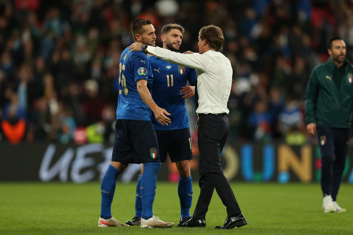 LONDON, ENGLAND - JULY 06: Italy's head coach Roberto Mancini (R) with Rafael Tolo?i (L) and Domenico Berardi during the UEFA Euro 2020 Championship Semi-final match between Italy and Spain at Wembley Stadium on July 06, 2021 in London, England. (Photo by Alex Morton - UEFA)