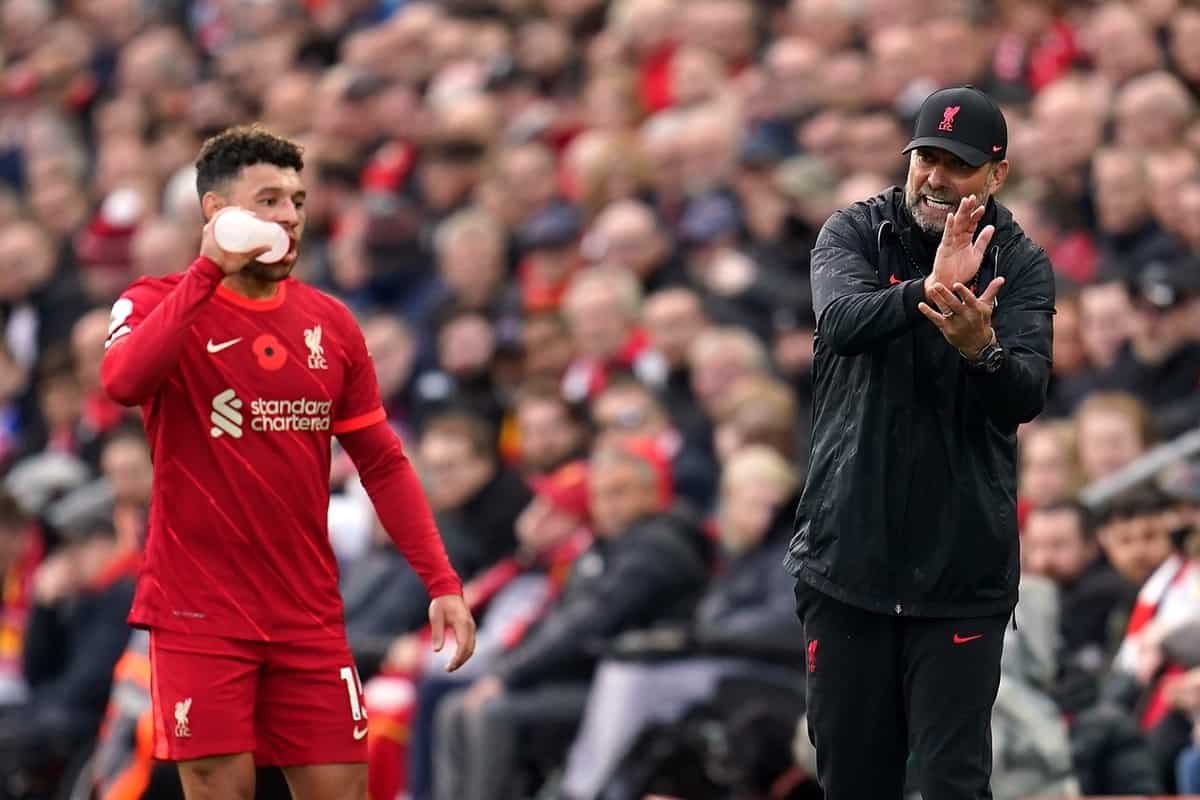Liverpool manager Jurgen Klopp speaks to Alex Oxlade-Chamberlain during the Premier League match at Anfield, Liverpool. Picture date: Saturday October 30, 2021. - Image ID: 2H3W78X