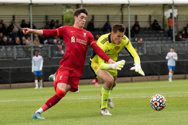 LIVERPOOL, ENGLAND - Sunday, May 1, 2022:  Liverpool's Layton Stewart (L) and Manchester United's goalkeeper Radek Vitek race for the ball during the Premier League 2 Division 1 match between Liverpool FC Under-23's and Manchester United FC Under-23's at the Liverpool Academy. (Pic by Jessica Hornby/Propaganda)