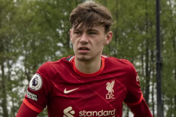 LIVERPOOL, ENGLAND - Sunday, May 1, 2022: Liverpool's captain Tom Clayton (L) , Conor Bradley (C) and Billy Koumetio warm up again before the second half during the Premier League 2 Division 1 match between Liverpool FC Under-23's and Manchester United FC Under-23's at the Liverpool Academy. (Pic by Jessica Hornby/Propaganda)