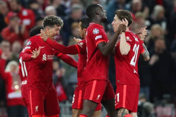 LIVERPOOL, ENGLAND - APRIL 13: Roberto Firmino of Liverpool celebrates with teammates after scoring their team's third goal during the UEFA Champions League Quarter Final Leg Two match between Liverpool FC and SL Benfica at Anfield on April 13, 2022 in Liverpool, England. (UEFA)