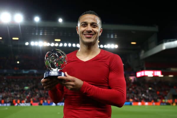 LIVERPOOL, ENGLAND - APRIL 27: Thiago Alcantara of Liverpool poses for a photo with their Playstation player of the match award after the UEFA Champions League Semi Final Leg One match between Liverpool and Villarreal at Anfield on April 27, 2022 in Liverpool, England. (Photo by Jan Kruger - UEFA/UEFA via Getty Images)